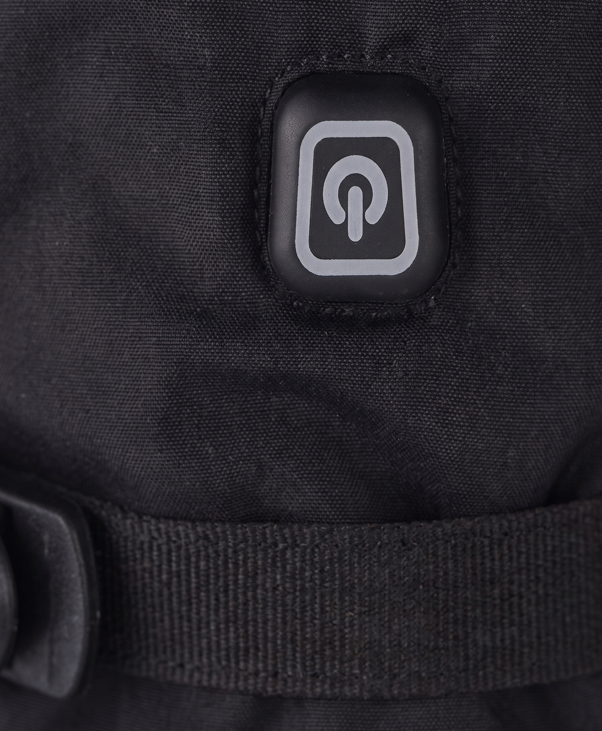 Close-up of the battery case with its cord and ON/OFF switch used to power the heated gloves