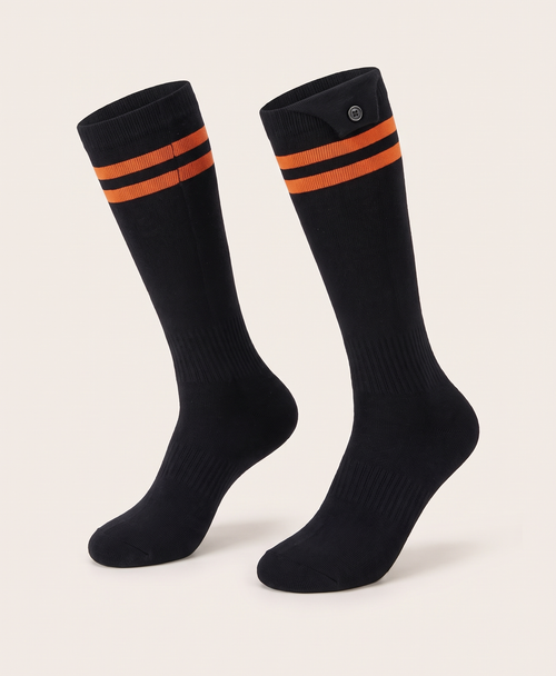 Pair of black high heated cotton socks with a striped cuff and a button on the cuff, shown on their own