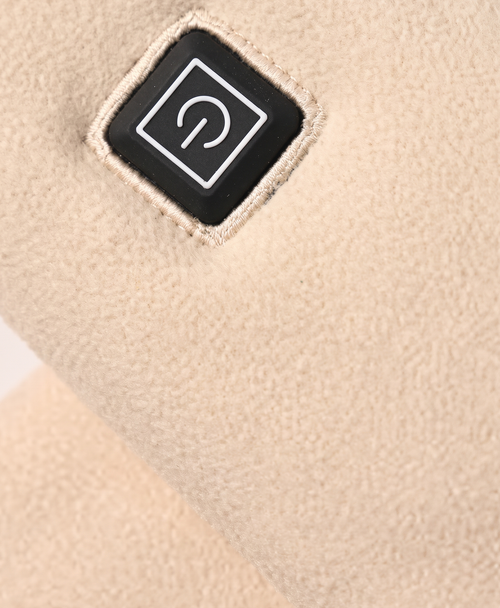 Close-up of the scarf's square power button and soft fleece fabric texture in khaki