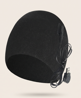 Black heated knit beanie with USB lead on a plain background