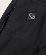 Power button patch and zip pocket with USB lead close-up