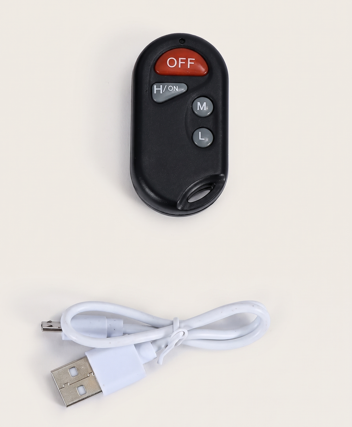 Wireless remote close-up: off, high, medium and low buttons