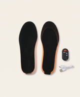 Pair of rechargeable heated insoles with wireless remote and USB charging cable