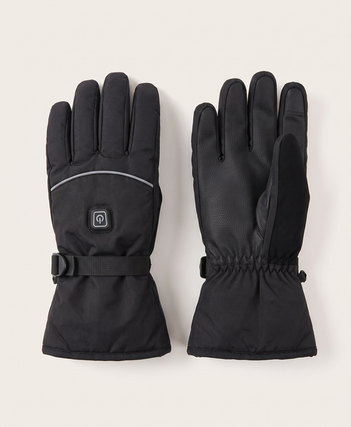 Two black split-finger heated gloves shown from above against a blue sky and snowy mountain