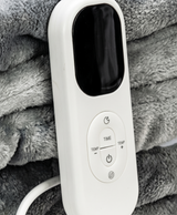Close-up of the white controller with LED display and power, time and temperature buttons