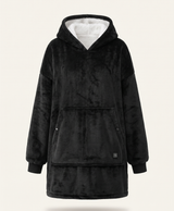 Oversized heated blanket hoodie in flannel with a large front pocket, shown on its own