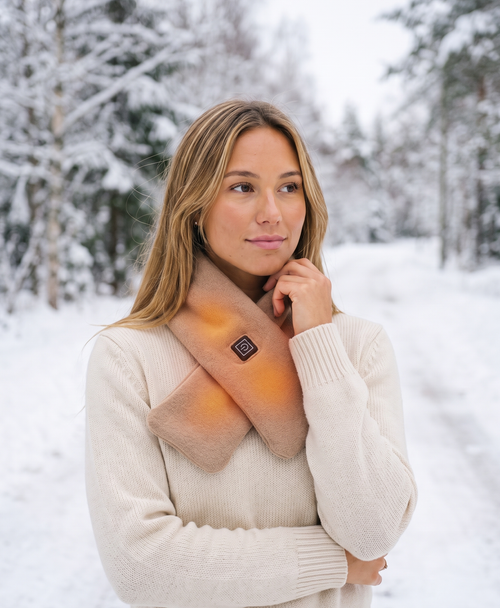 Light coffee heated scarf worn by a woman outdoors in winter, lifestyle photo