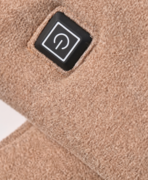 Close-up of the one-button power control on the light coffee heated scarf