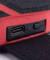 Close-up of heated insole underside with size lines, care label and heat level runtime chart