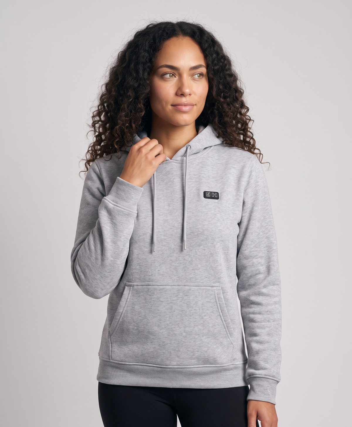 Gray women's heated hoodie with 31 heating zones shown glowing on the front and back, studio product photo