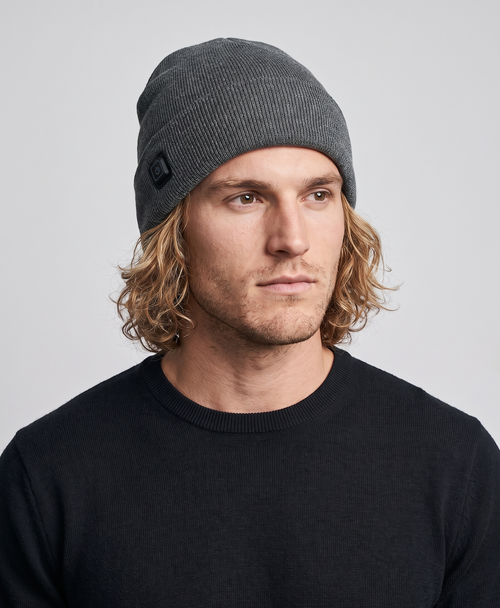 Gray ribbed cotton knit heated beanie for men with USB heating cable and switch, studio photo