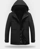Black heated jacket with detachable hood, front chest pockets and sleeve zip pocket on a plain background